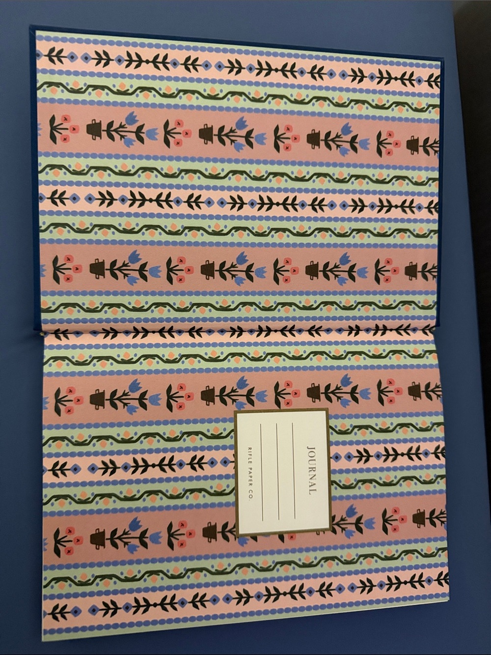 Rifle Paper Co. Navy Hardcover Journal with Colorful Stacked Book Illustration - Picture 2 of 2